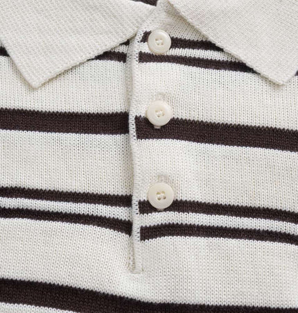 Turn-Down Collar Stripe Sweater featuring bold stripes and letter embroidery detail.