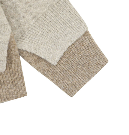 Two-Piece Style Knit Sweater – Loose Fit showing detailed cuffs and texture of the knit fabric.