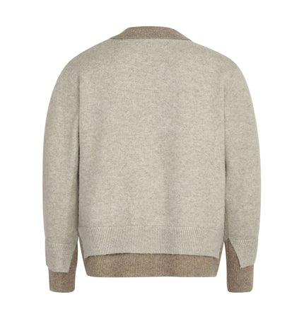 Back view of the Two-Piece Style Knit Sweater – Loose Fit in a light beige color.