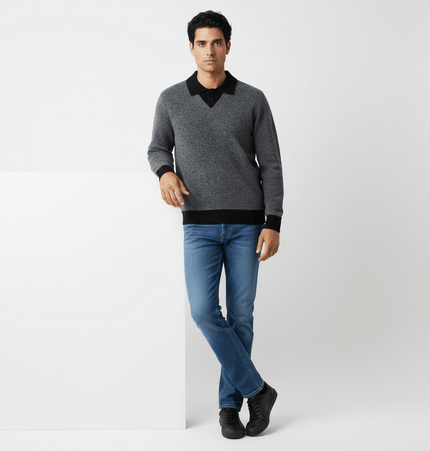 Two-Piece Style Knit Sweater – Loose Fit worn by a model, showcasing the casual solid color design and turn-down collar.