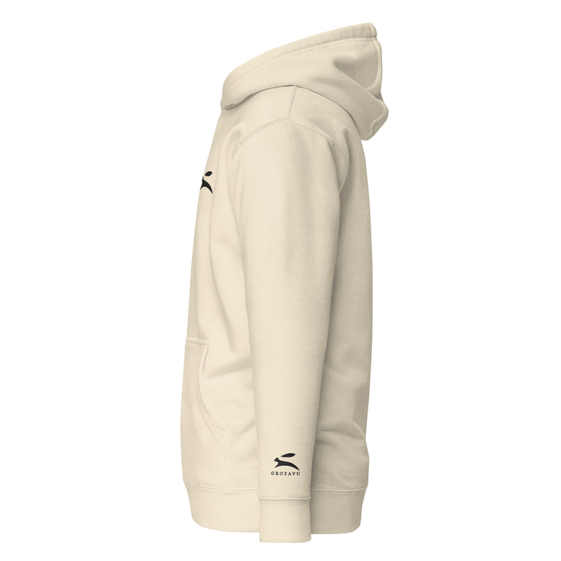 Grozavu Women's Pullover Hoodie in bone with the hare on the chest, left side view