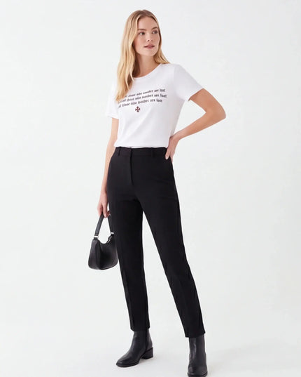 Heavyweight Carbon Tee lifestyle image — the piece worn in context showing natural drape and proportions