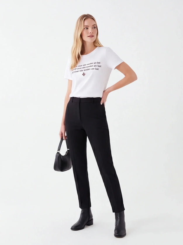 Heavyweight Carbon Tee lifestyle image — the piece worn in context showing natural drape and proportions