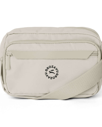 Maison Grozavu Onyx Crossbody Fit in Stone — front view showing the clean construction and premium fabric drape