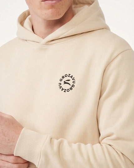 Front view of the Maison Grozavu Archival Ecru Hoodie in hoodie — showing the structural collar.