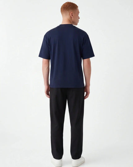 Front view of the Maison Grozavu Pure Carbon Tee in shirt — showing the robust construction.