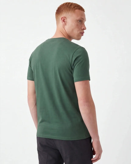 Front view of the Maison Grozavu Bone Tee Foundation in shirt — showing the sleek silhouette.