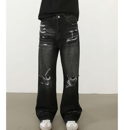 Washed Distressed Straight Jeans – Loose Fit displayed on model, featuring a vintage washed denim look and distressed details.