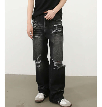 Washed Distressed Straight Jeans – Loose Fit worn by a model in a stylish urban setting, showcasing a bold high-street look.