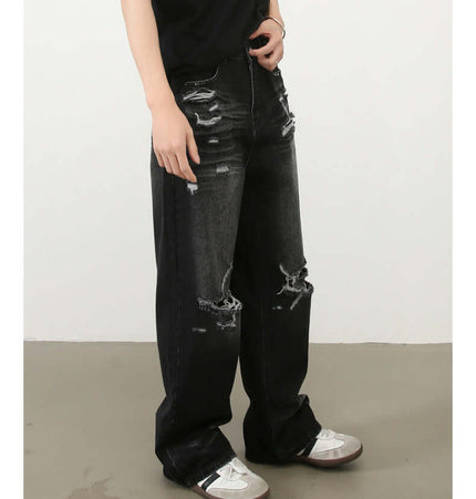 Washed Distressed Straight Jeans – Loose Fit worn by model showcasing high-street style and comfort.