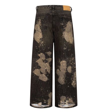 Washed Retro Loose Fit Denim Pants - back view showing unique distressed design and loose-fit silhouette.