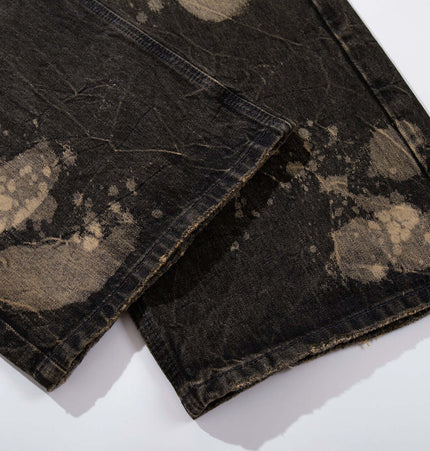 Washed Retro Loose Fit Denim Pants with unique splatter design and frayed hem for street style.