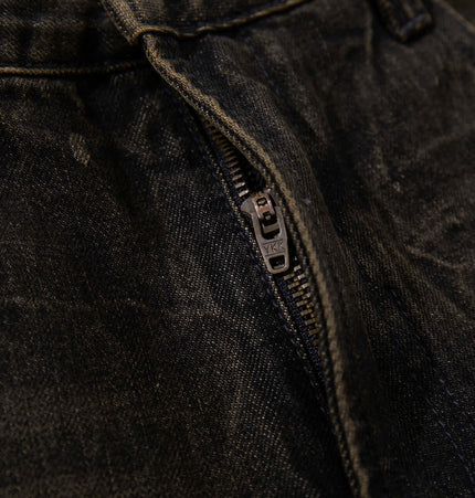 Close-up of the zip detailing on Washed Retro Loose Fit Denim Pants.