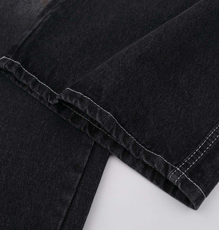 Washed Straight Black Jeans – Loose Fit close-up of the hem showcasing the stylish details and fabric texture.