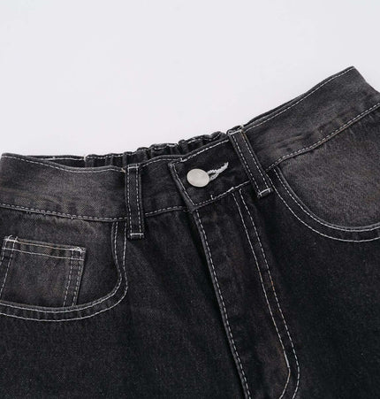 Washed Straight Black Jeans – Loose Fit close-up of waistband and pockets with modern styling features.