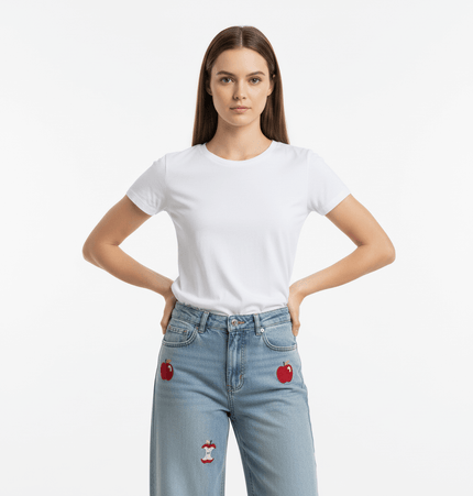 Model wearing Washed Straight Cropped Jeans with apple design patches and a white t-shirt, showcasing a youthful style.