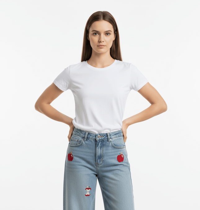 Model wearing Washed Straight Cropped Jeans with apple design patches and a white t-shirt, showcasing a youthful style.