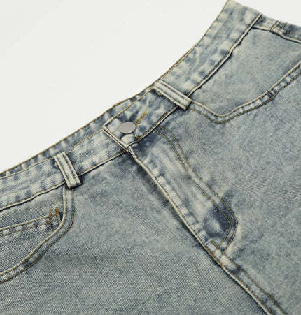 Washed Straight Cropped Jeans close-up detail showing light blue washed finish and button closure.