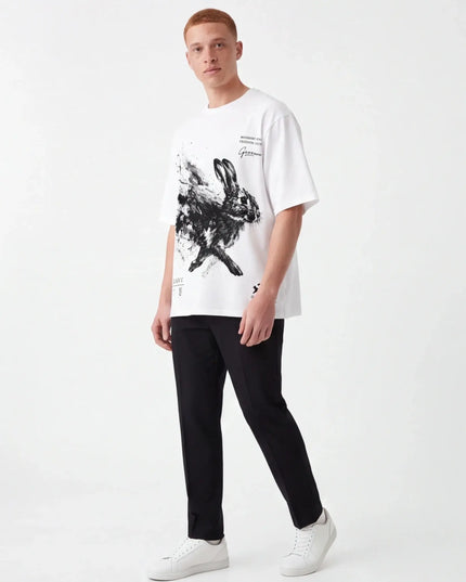 Quiet Alabaster Tee detail shot — collar, cuff or waistband construction visible in precise detail