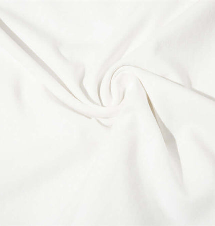Close-up view of soft, white cotton fabric used in the Letter Cross Print Tank Top - Loose Fit for breathable summer comfort.