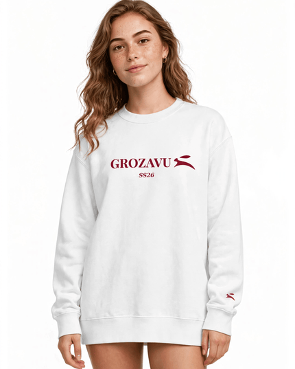 White brushed fleece crewneck with double-needle topstitch, studio shot