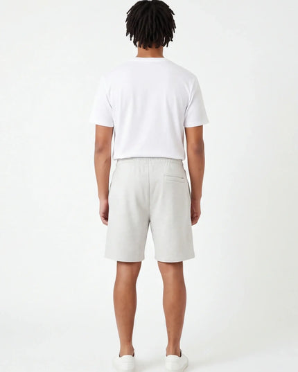 Stone Trousers Volume — close-up showing the precision of the neckline or waistband construction