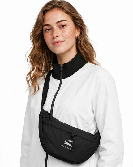 12-litre crossbody day bag in water-repellent recycled polyester, worn