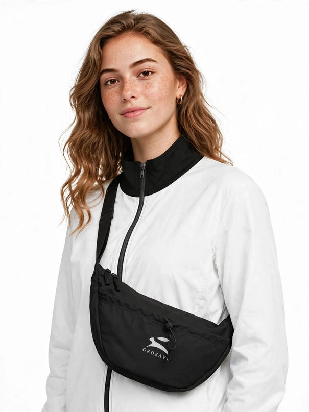 12-litre crossbody day bag in water-repellent recycled polyester, worn