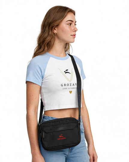 Left profile showing the rain flap on the utility crossbody