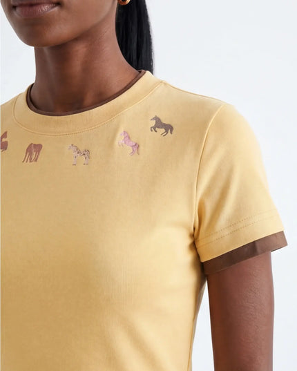 Ghost Tee Silhouette — three-quarter view showing the silhouette from the front-left angle in neutral