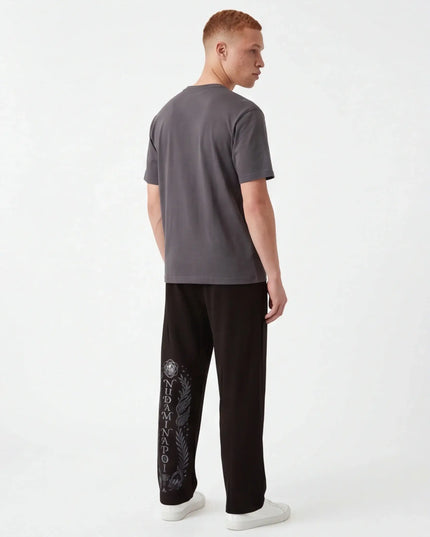 Front view of the Maison Grozavu Quiet Ecru Top in top — showing the clean lines.