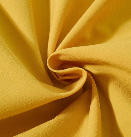 Close-up of soft yellow fabric showcasing texture for Retro Hooded Zip Jacket – Loose Fit.