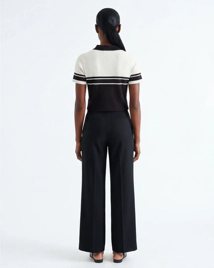 Maison Grozavu Minimalist Dune Polo — side profile view showing the shoulder drop and sleeve length