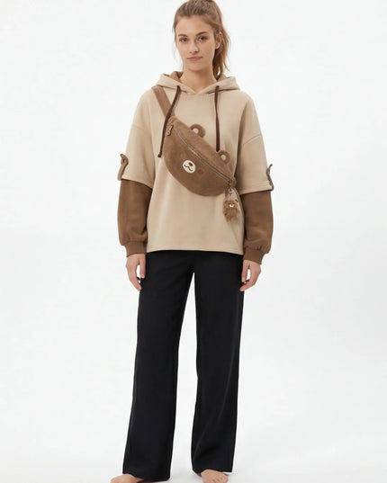 True Earth Hoodie lifestyle image — the piece worn in context showing natural drape and proportions