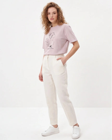 Bespoke Concrete Tee Washed Lavender — movement lifestyle shot showing the relaxed boxy silhouette in wear