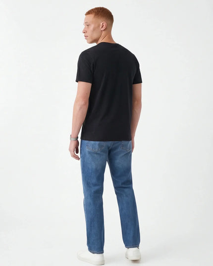 Maison Grozavu Modern Stone Crewneck — side profile view showing the shoulder drop and sleeve length